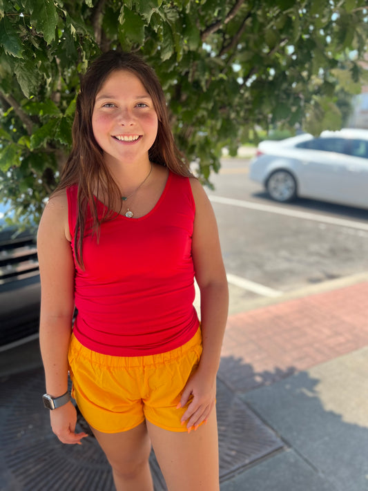 Smocked waistband yellow gold shorts